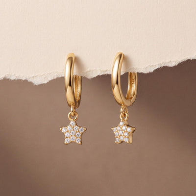 14K gold star hoop earrings, styled view