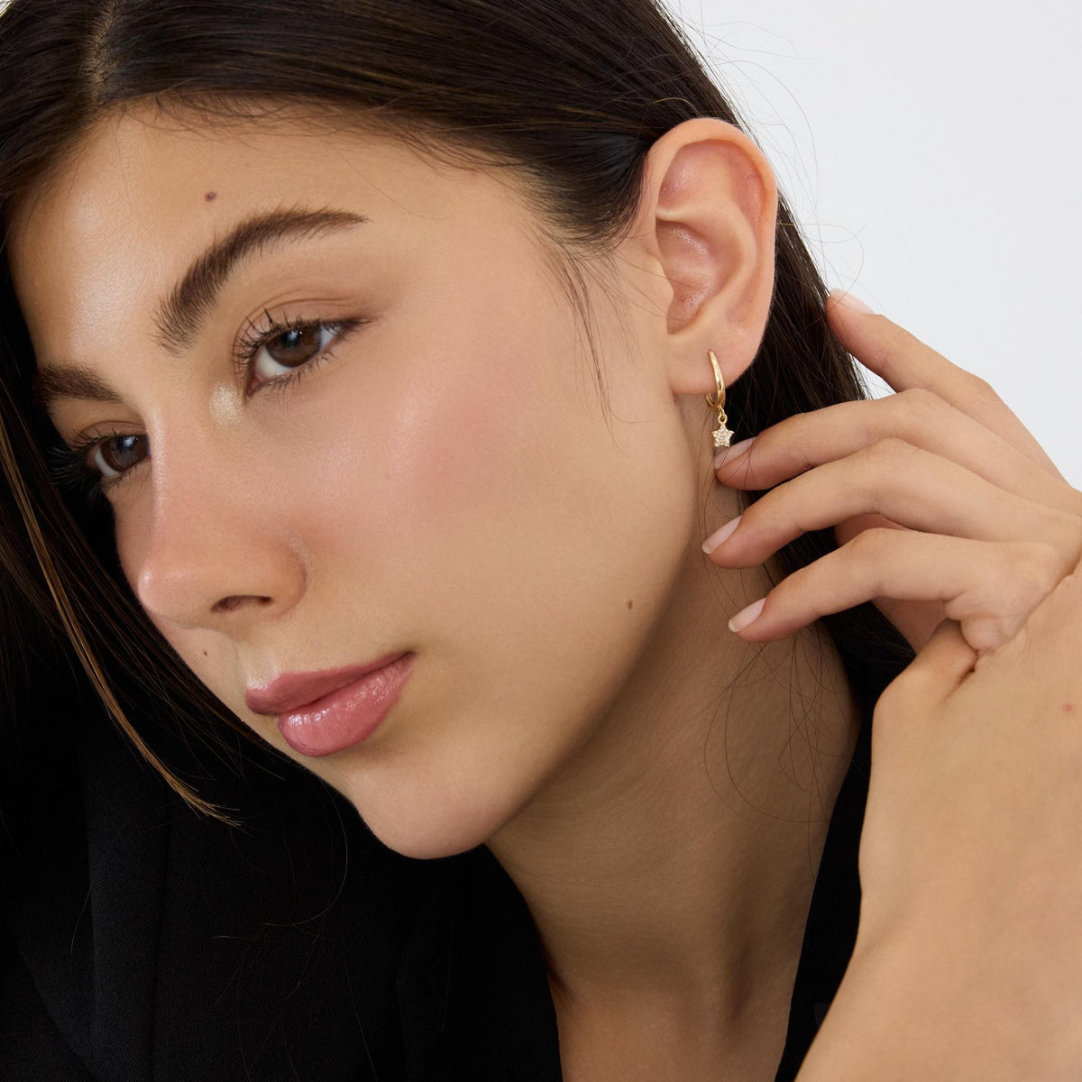 14K gold star hoop earrings, styled view