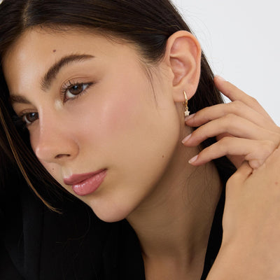 14K gold star hoop earrings, styled view