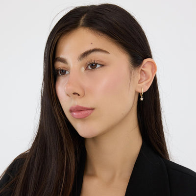 14K gold star hoop earrings, styled view