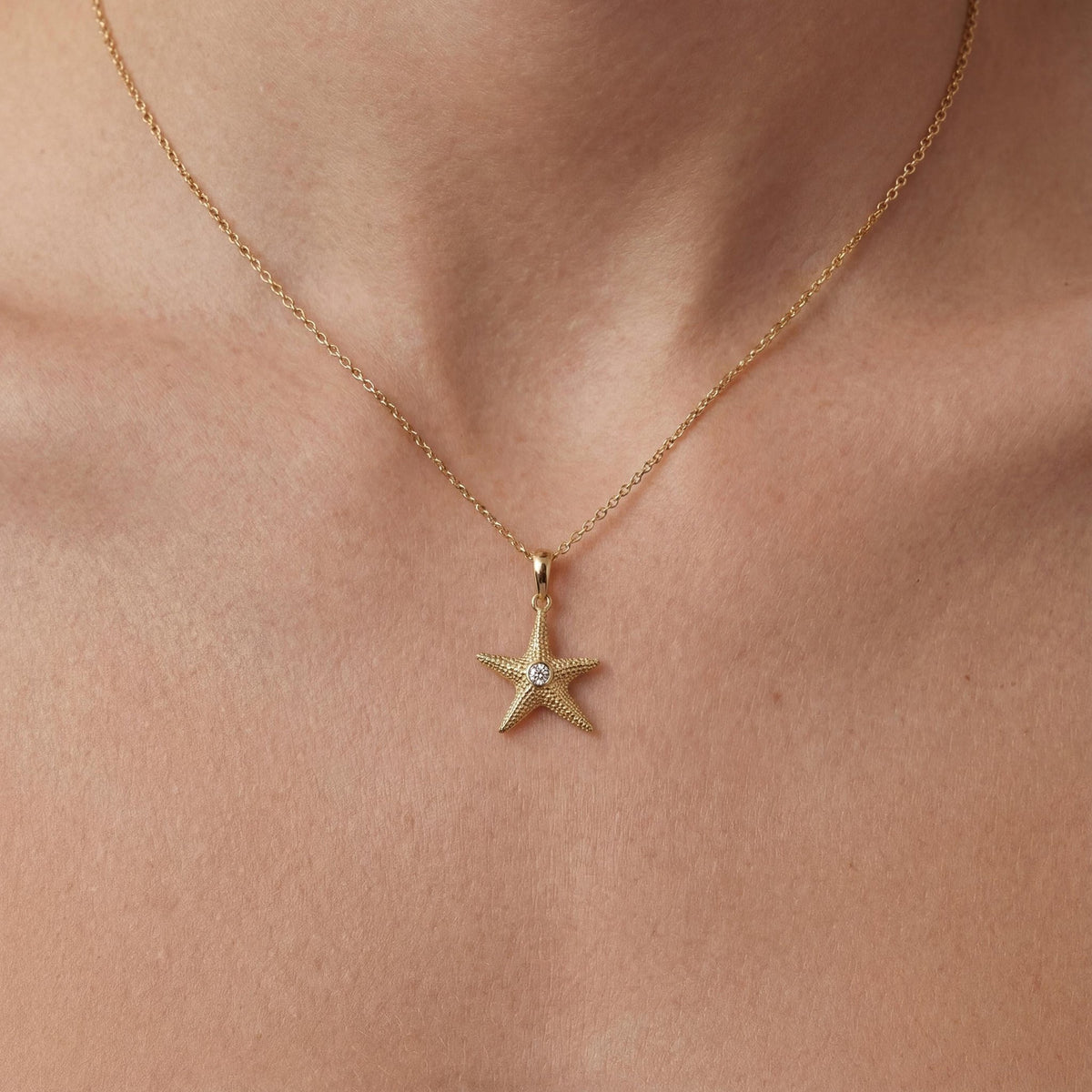 14K gold star zirconia necklace minimal starfish unisex jewelry necklace, styled view