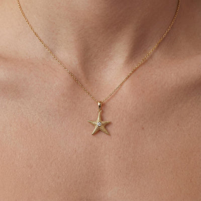 14K gold star zirconia necklace minimal starfish unisex jewelry necklace, styled view