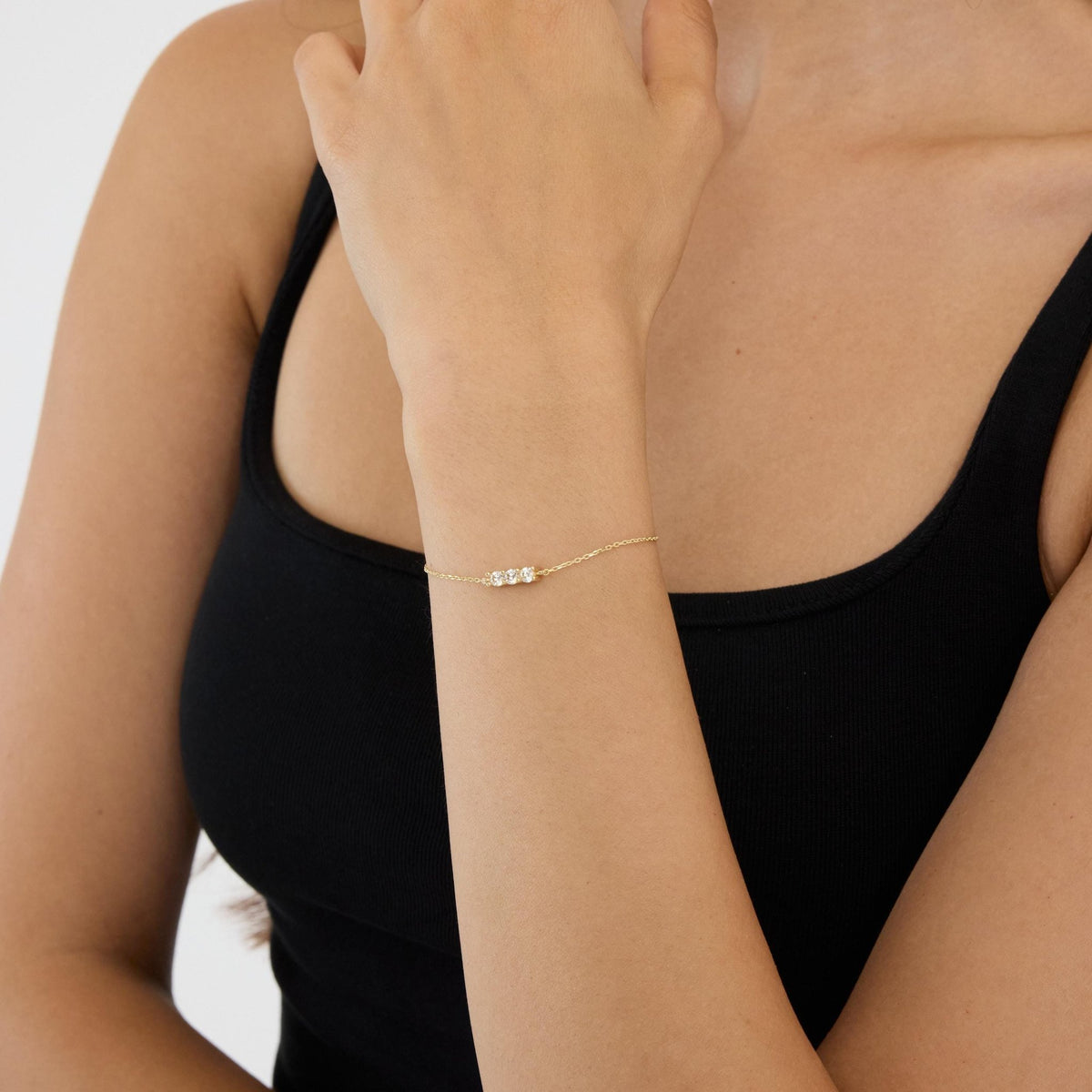 14K gold three stone bracelet, styled view