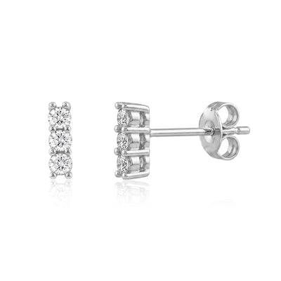 14K white gold three stone cubic zirconia stud earrings, front and side view with butterfly back