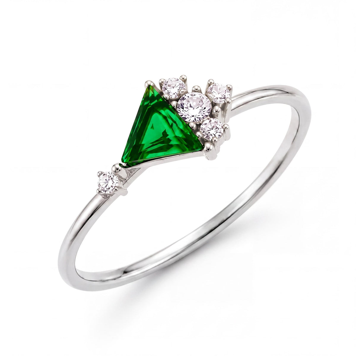 14K white gold triangle simulated emerald ring with a round cubic zirconia cluster, on white
