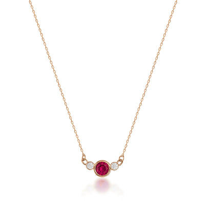 14K gold necklace with a round red Simulated Ruby and two small cubic zirconia on a delicate chain