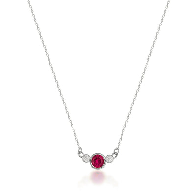 14K white gold necklace with central round red Simulated Ruby and two sparkling side cubic zirconia